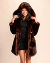 Women's Hooded Brown Faux Fur Coat by SpiritHoods. Vegan fake fur parka jacket for date nights, events and everyday winter style, styled with a classic black dress.