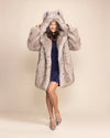 Women's Arctic Wolf Luxe Faux Fur Coat Featuring an oversized hood with wolf ears and a plush grey-silver fake fur finish.