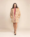 Luxury tan faux fur jacket for women with large shawl collar, perfect for date nights and high-fashion layering