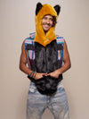 Man wearing Collector Edition Golden Wolf Luxe Faux Fur SpiritHood, front view 1