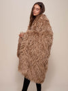 Woman wrapped Alpaca Faux Fur Throw, side view 2