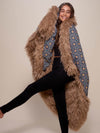Woman wrapped Alpaca Faux Fur Throw, side view