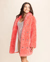 Sustainable Luxury: a Pink Panther fake fur coat for women made from 100% cruelty-free materials.