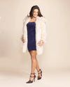 Women's ivory white faux fur hooded jacket with a relaxed fit, ideal for cozy and elegant every-day styling