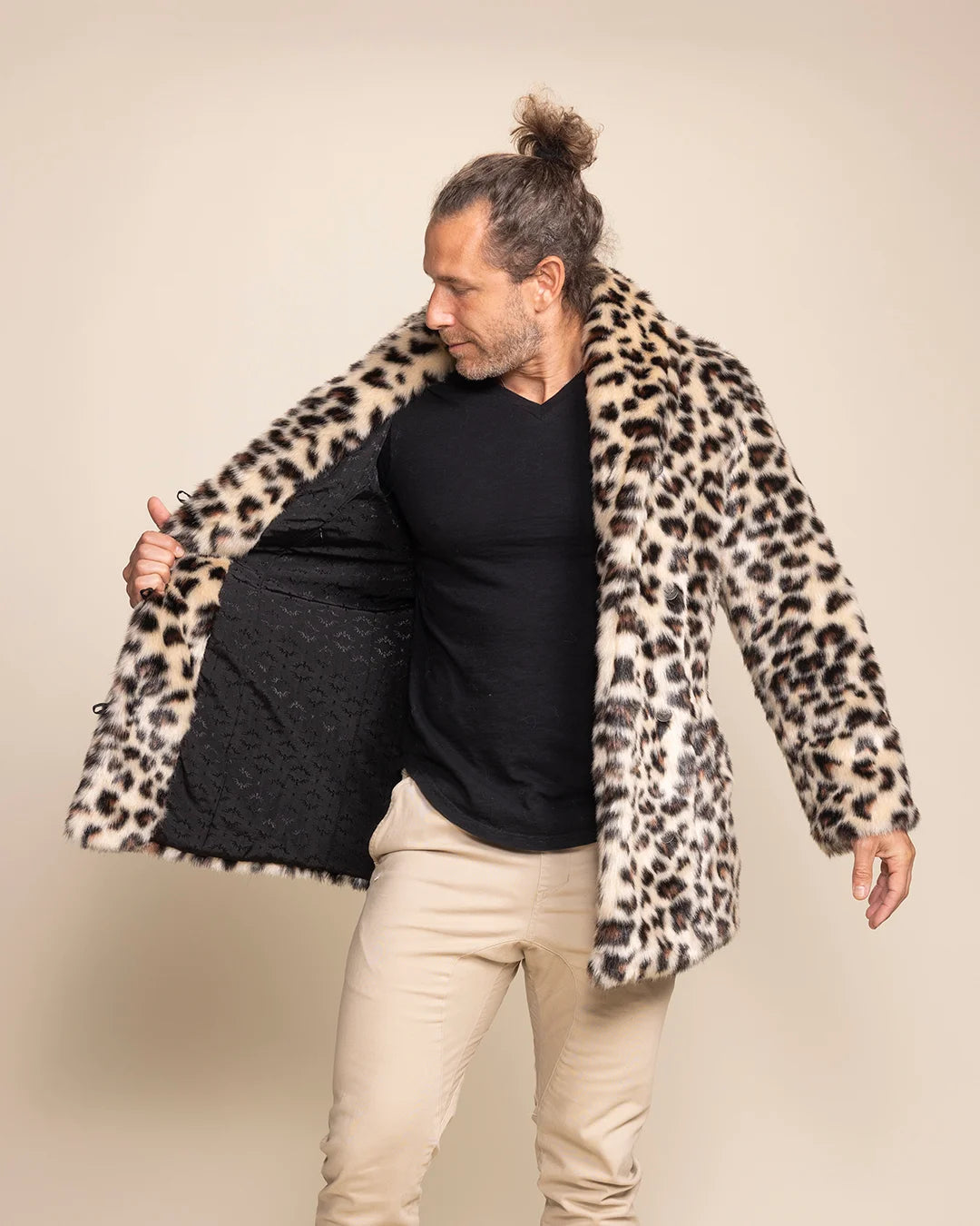 Unisex Oncilla animal print fake fur festival jacket featuring 4 deep pockets and a warm, stylish collar.