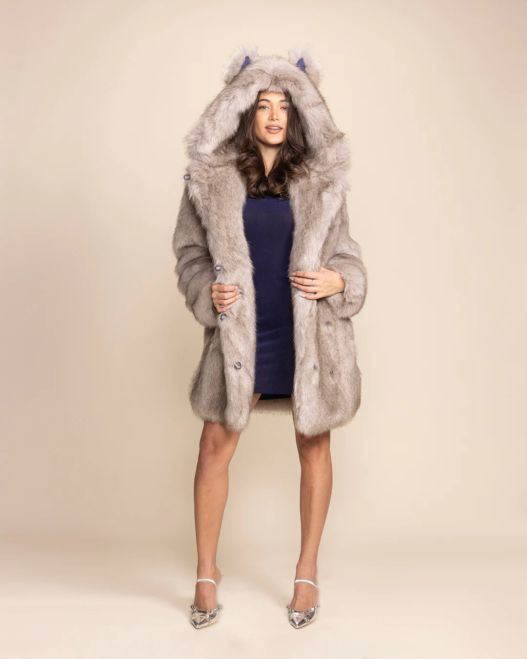 Top-rated festival fashion: a grey luxury faux fur coat with animal ears and custom wolf face buttons.