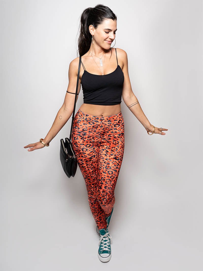 Brunette Model Wearing Poly-Velvet Leggings in Sunrise Cheetah Design