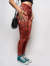 Female Model Wearing Sunrise Cheetah Velvet Leggings Made From Poly-Velvet