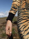 Woman wearing Liger Velvet Classic Faux Fur Animal Onesie, front view 2
