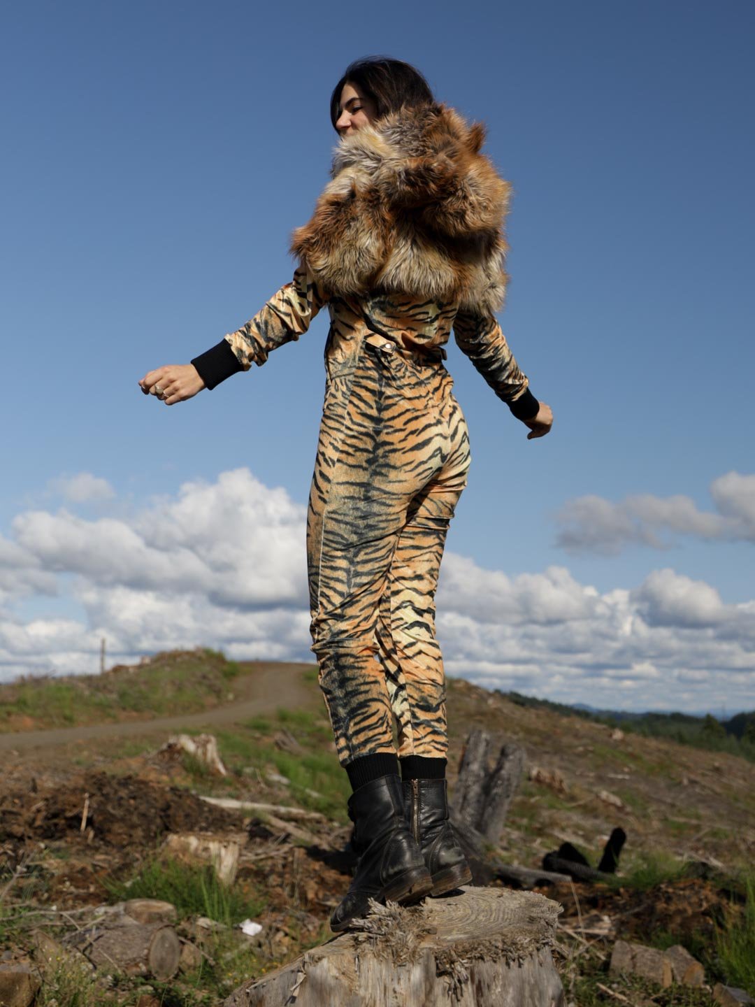 Woman wearing Liger Velvet Classic Faux Fur Animal Onesie, back view 4