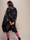 Woman wearing Night Fox Fabric Poncho, back view 1