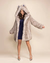 Front/Arm Out view of the SpiritHoods Luxe Classic Coat in Arctic Wolf grey with plush synthetic fur.