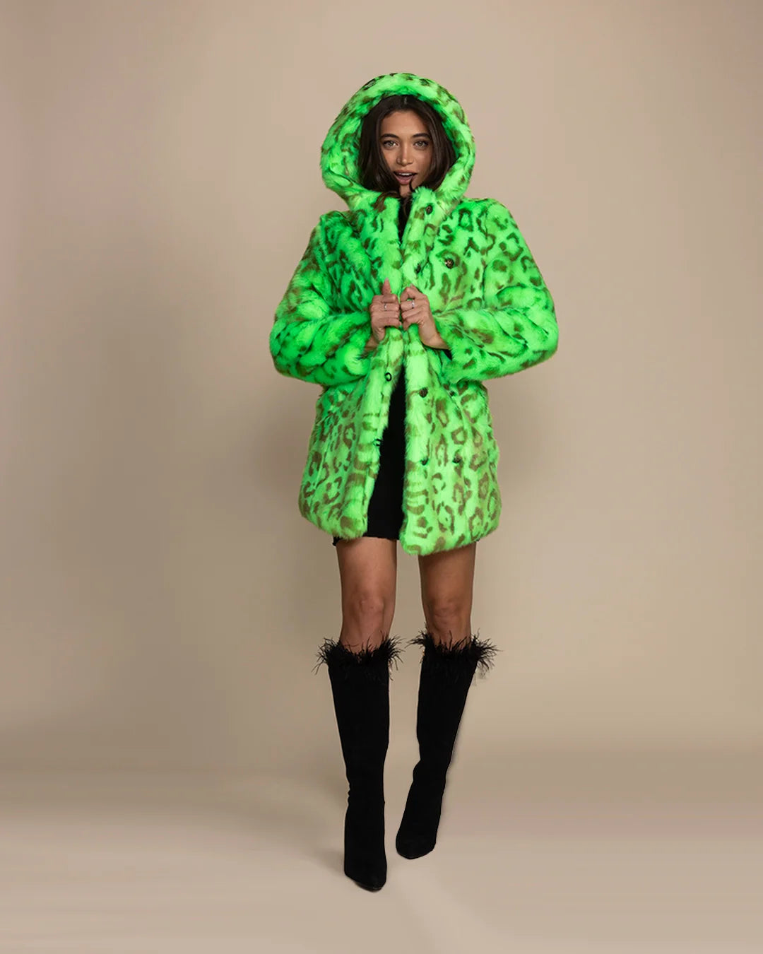 Top-rated festival fashion: a women's colorful neon green leopard fur coat with an oversized hood and ears.