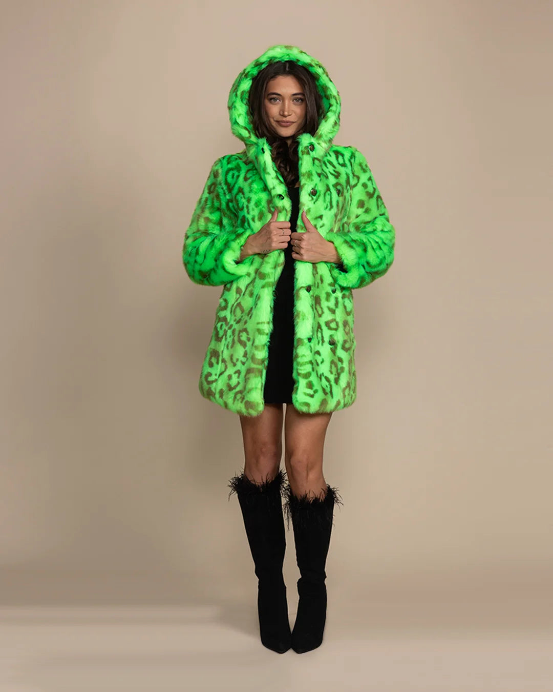 Premium 100% vegan fashion: a women's neon green leopard print coat designed with limited waste production.