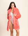 Womens vibrant blush pink vegan fur layering piece perfect for festival fashion and burning man looks.