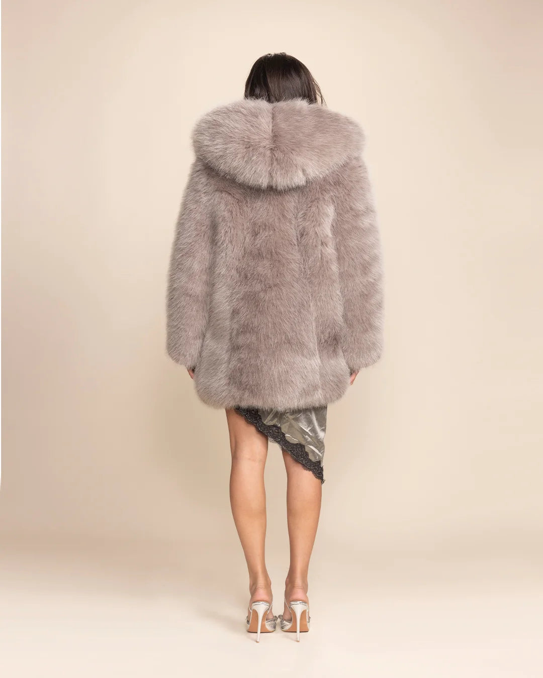 Relaxed fit Grey Fox faux fur parka for women, featuring high-quality synthetic fur and a signature hooded design.