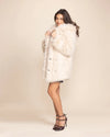 Premium women's white plush faux fur outerwear featuring an oversized wolf hood and tailored relaxed silhouette