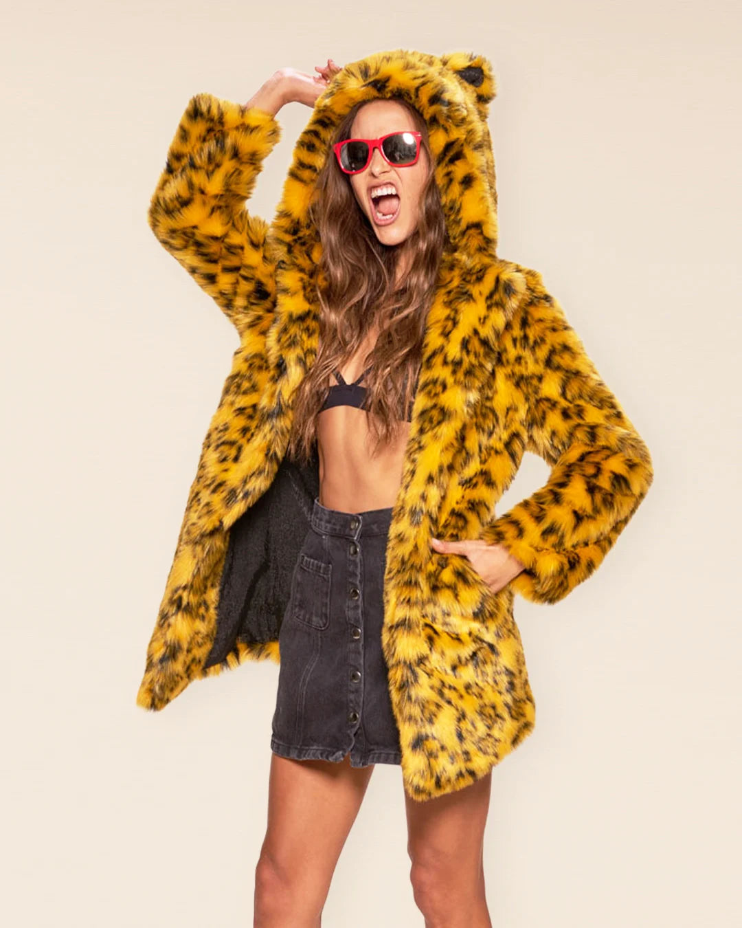 Relaxed Fit yellow cheetah faux fur parka for women, featuring 100% vegan fashion and a signature animal-ear hood