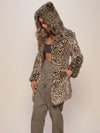 Woman wearing Forest Leopard Luxe Classic Faux Fur Coat, side view