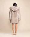 Oversized Hooded fake fur jacket for women, perfect for winter, festivals and cold-weather events.