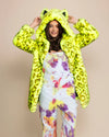 Bright animal print coat for women with  feline-ears adorned on-top the oversized hood, designed to glow under blacklight for festivals and streetwear.