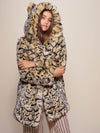Woman wearing Classic Ocelot Luxe Faux Fur SpiritHood Coat, front view 4