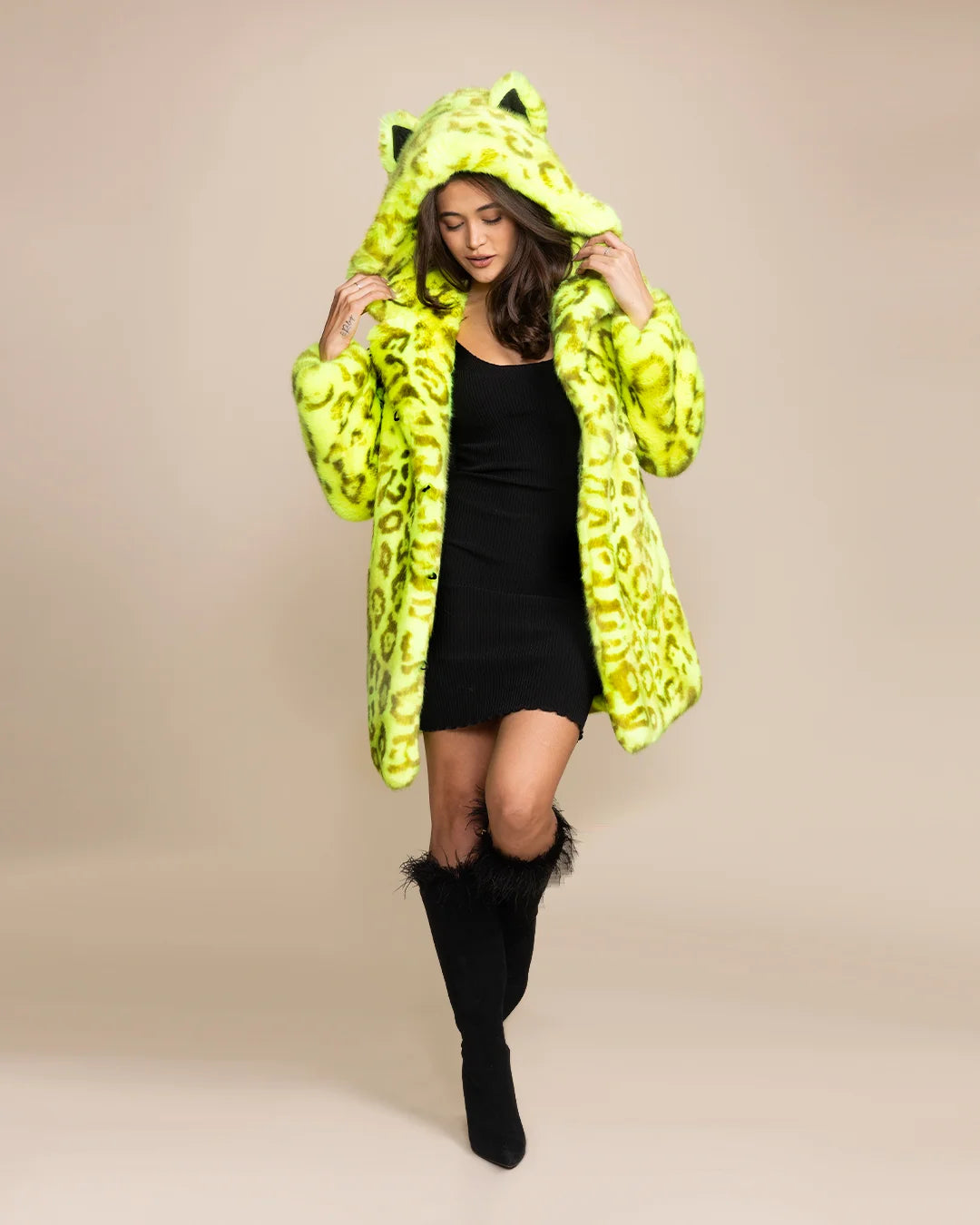 Neon yellow leopard fur coat designed for festivals, featuring a UV-reactive glow and cozy, relaxed silhouette.