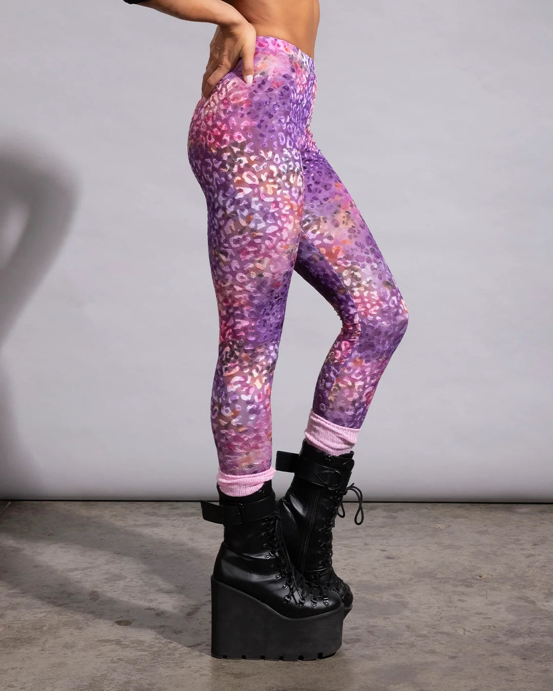 Top-rated festival fashion: women's sheer burnout velvet festival leggings showcasing a colorful animal print pattern.