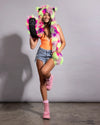 Woman smiling in a Neon Fiesta Cat collector edition SpiritHood with an attached long faux fur scarf.