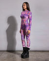Festival style unitard in a burning velvet fabric texture with an eye-catching neon pink and purple leopard print.