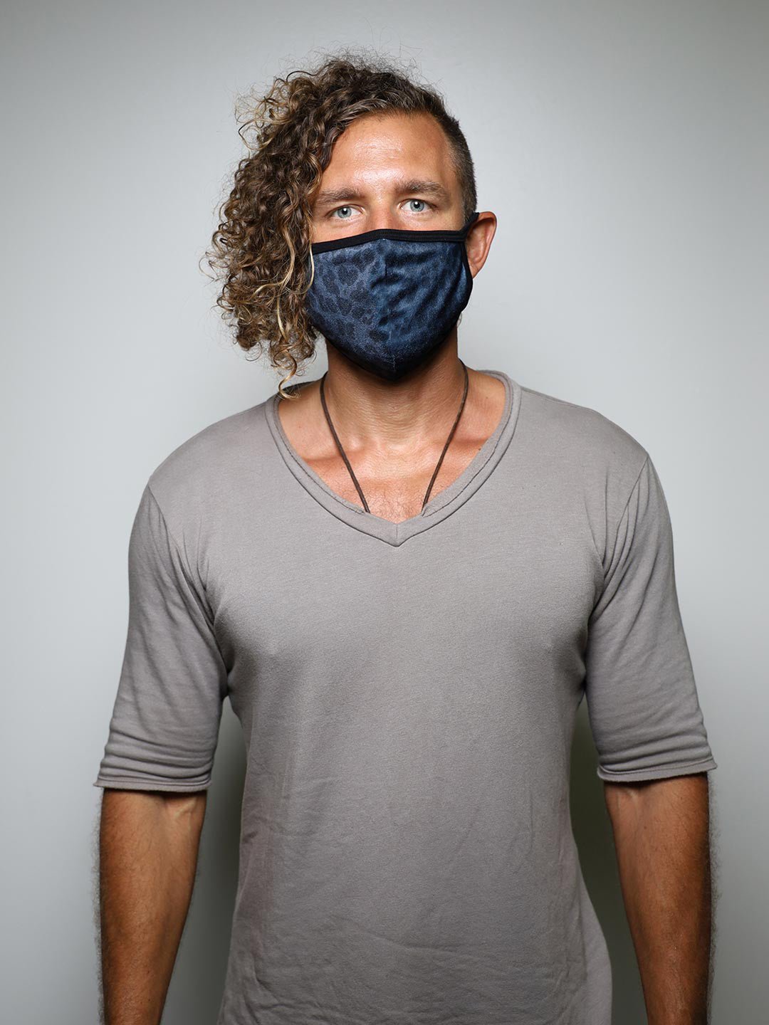 Man wearing Black Panther Cloth Face Mask, front view
