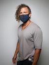 Man wearing Black Panther Cloth Face Mask, side view