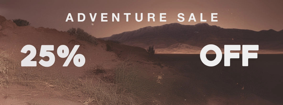 Desert landscape with 'Adventure Sale 25% Off' text overlay