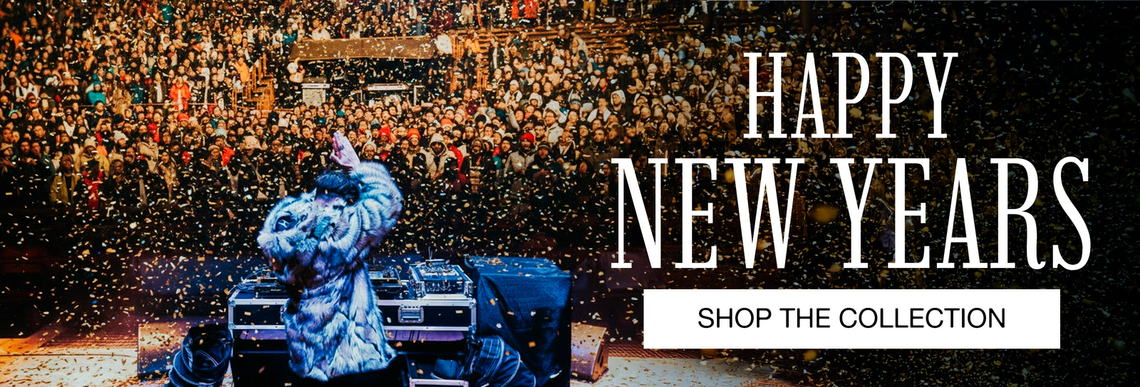A DJ wearing SpiritHoods' "Wolverine" faux fur coat on stage in front of a huge a crowd and 'Happy New Years' text overlay.
