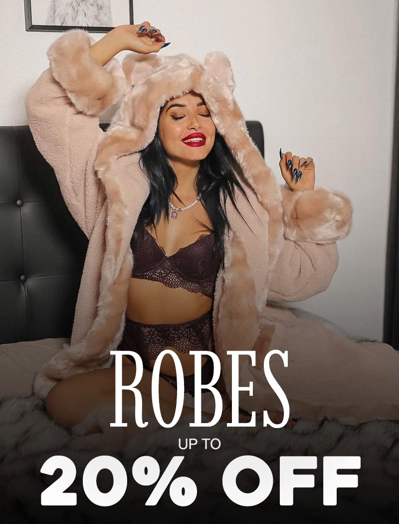 Woman in a fluffy robe with promotional text for robes on a bed.