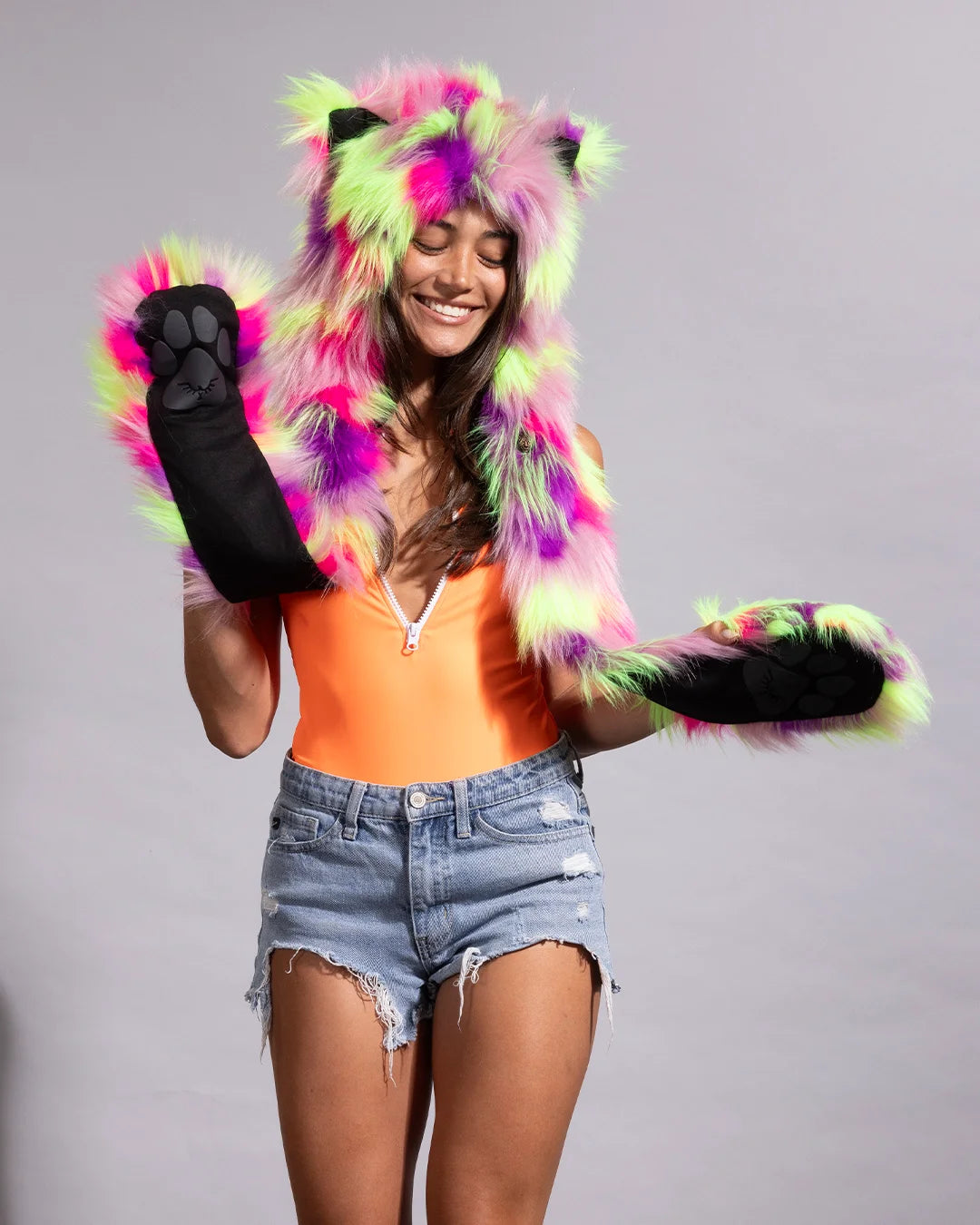 EDM rave animal hood in an electric neon fiesta cat pattern that glows brilliantly under night event blacklights.