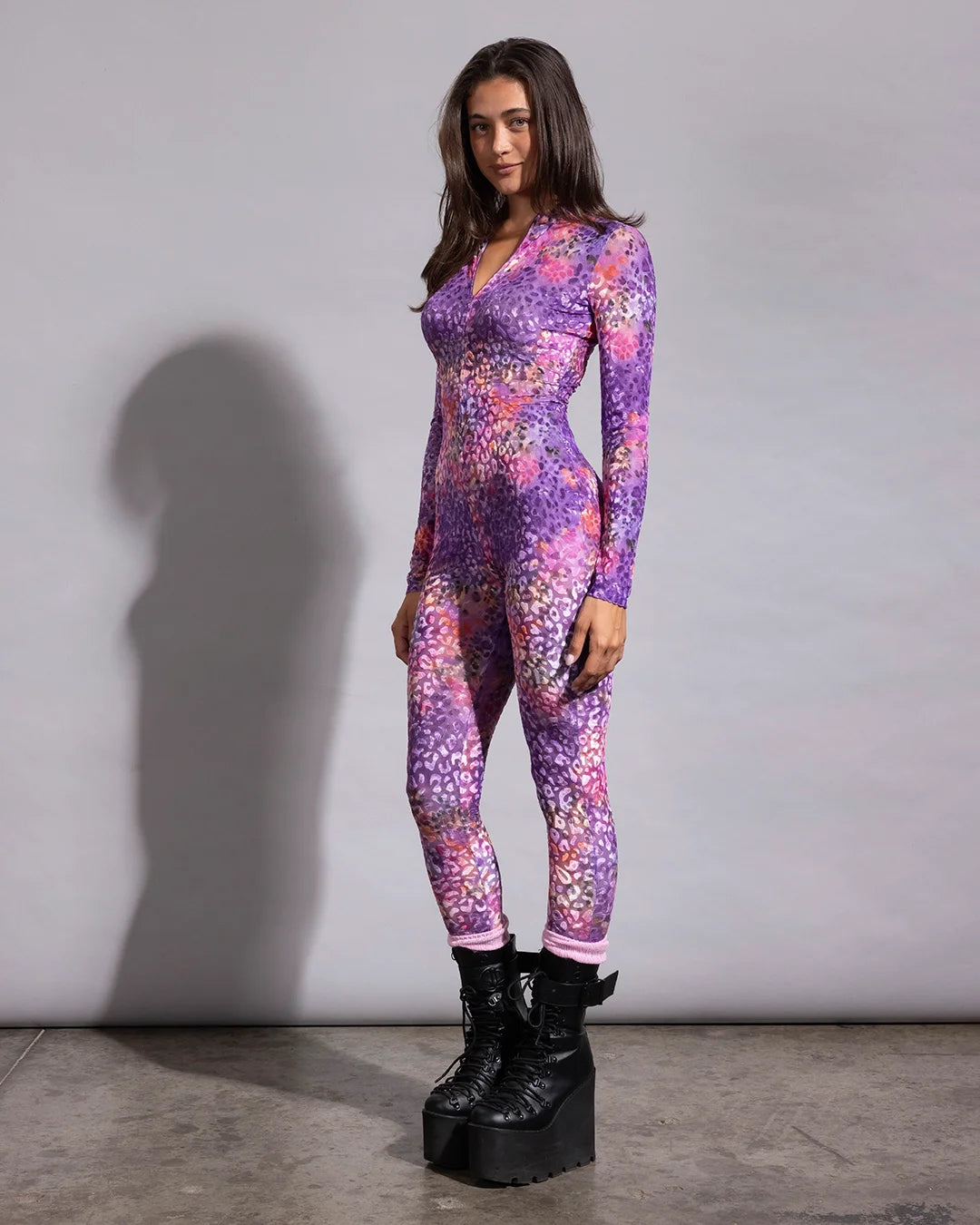 Sheer pink leopard catsuit intended for creative festival layering, rave parties, and streetwear outfits.