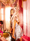Woman wearing faux fur Collector Edition Timber Wolf Shawl