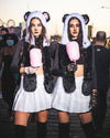 SpiritHoods Panda Bear Halloween Costume Inspiration Two Girls Eating Cotton Candy At the Pier Wearing SpiritHoods Panda Bear Fake Fur Hoods - With Painted on Nose and Black Lipstick