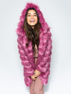 Woman Wearing Rose Finch Collector Edition Faux Fur Coat with Hood