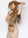 Woman wearing faux fur CinnaBunny Collector Edition SpiritHood, side view 3
