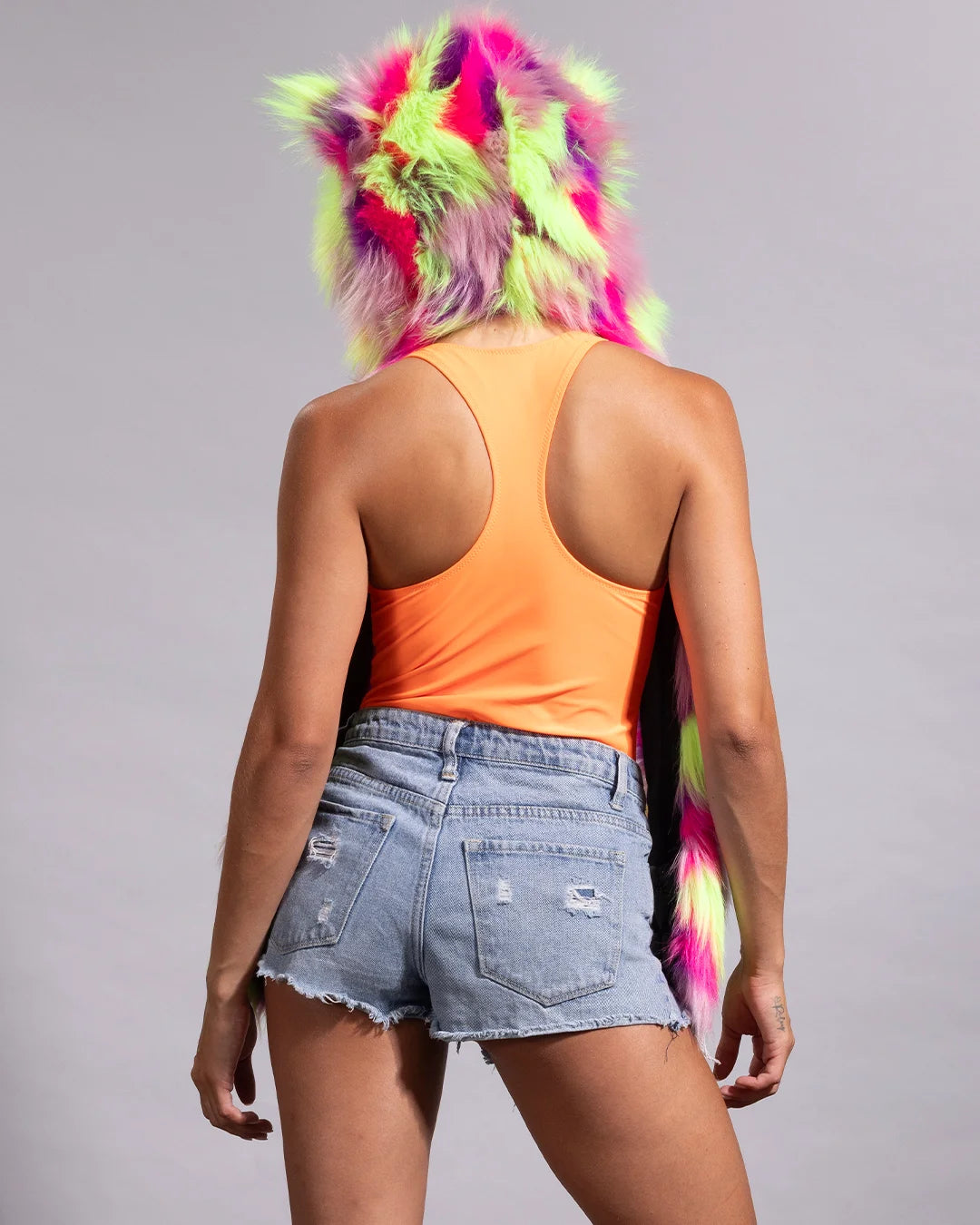 SpiritHoods collector edition neon cat hood shawl accessory styled over a vibrant summer outfit.
