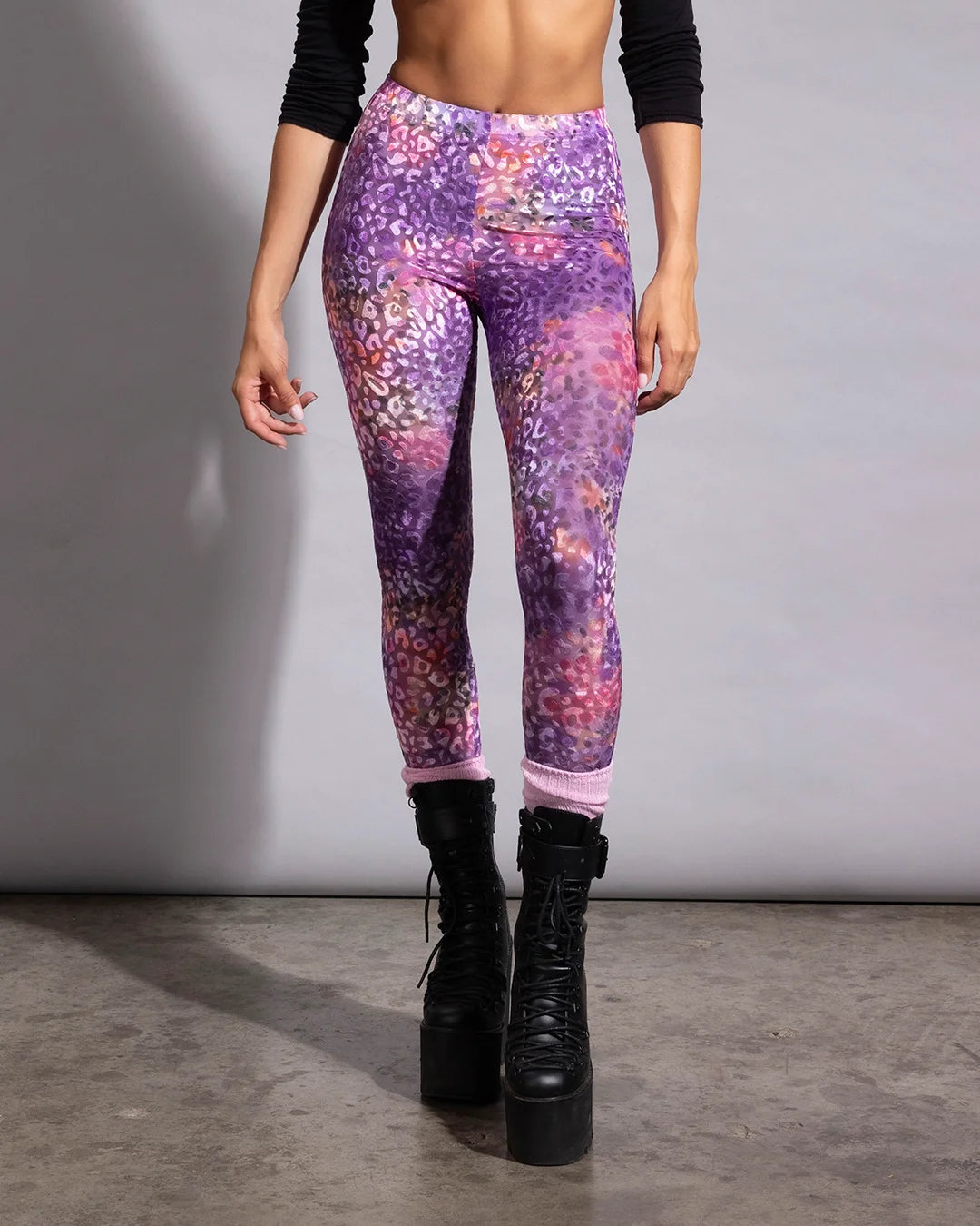 Breathable pink leopard rave pants intended for creative festival layering, outdoor raves, and bold streetwear.