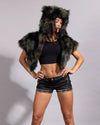 Dark camo feline fake fur capelet designed as a high-mobility, lightweight layer for Burning Man and outdoor music festivals.