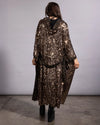 Lightweight gold sequin hooded kimono paired with black platform rave boots for festival fashion inspiration.