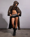 Boho-chic meets rave wear: a metallic leopard sequin jacket robe that catches the light perfectly.