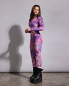 Form-fitting rave unitard featuring a dynamic tie-dye pink leopard pattern with maximum stretch.