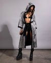 Lightweight silver sequin hooded kimono paired with black rave boots for the ultimate festival fashion look.