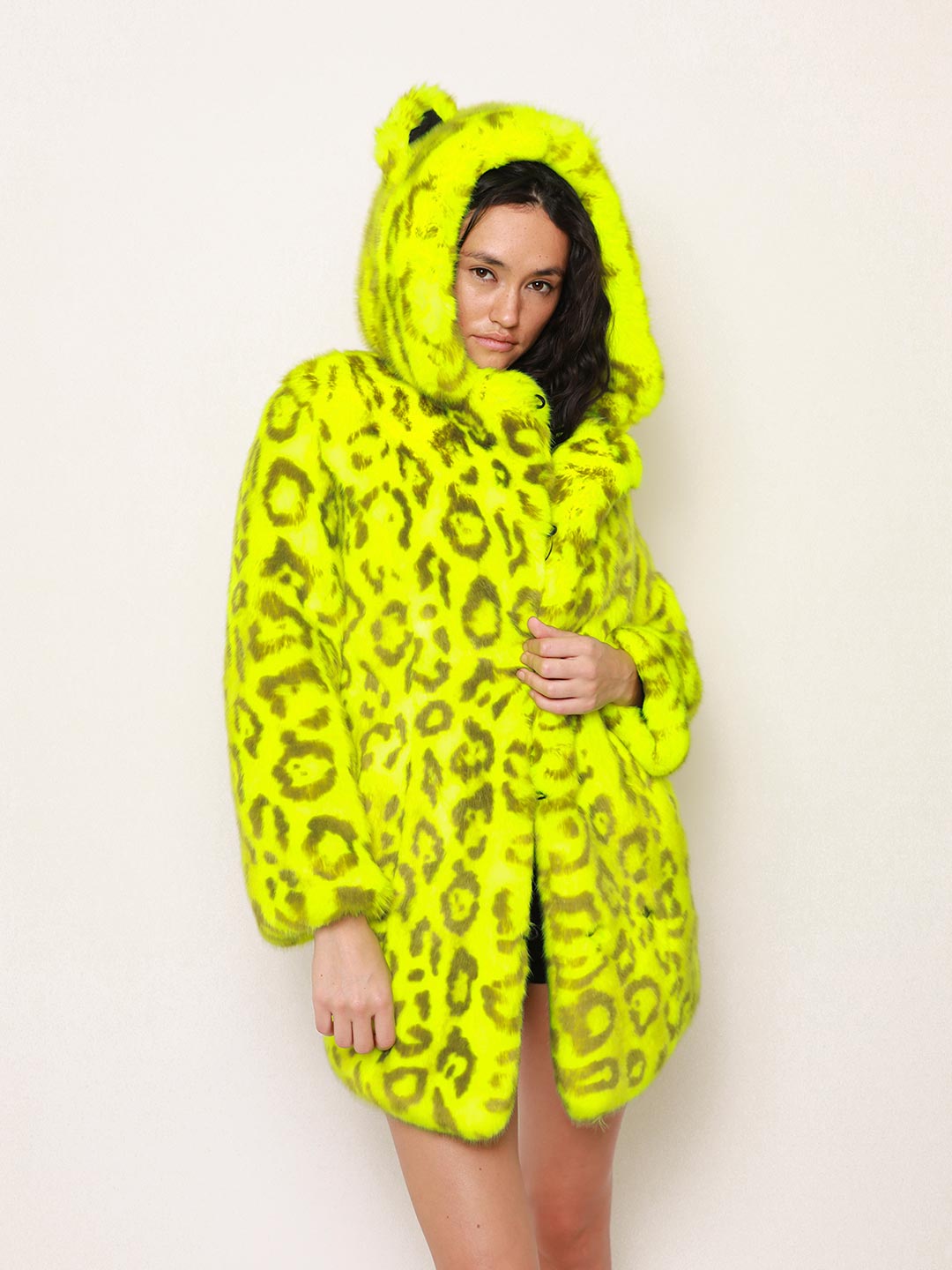 Woman wearing Neon Yellow Leopard Luxe Classic Faux Fur Coat, front view 1
