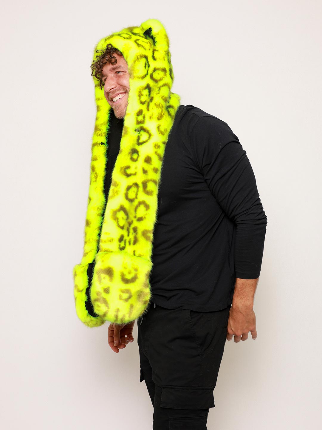 Man wearing Neon Yellow Leopard Luxe Collector Edition Faux Fur Hood, side view